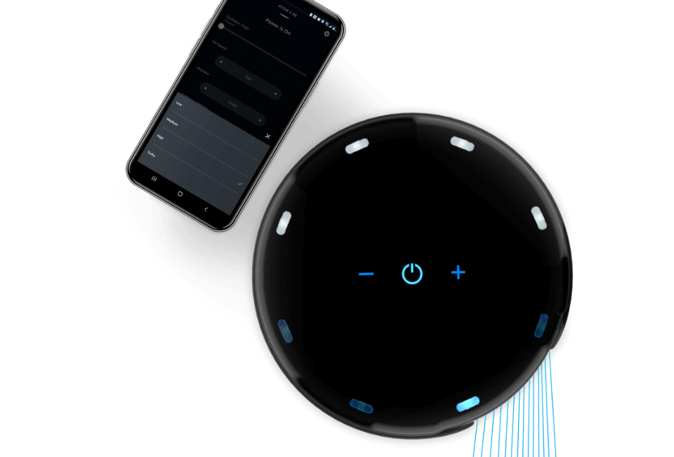 Atom 2W AE Compact Oscillating Tower Circulator with Wall Mount Controls Atom 2W AE Compact Oscillating Tower Circulator with Wall Mount Controls with alexa opened on a phone next to it
