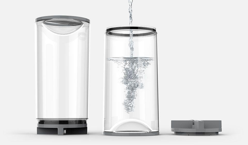 ev100 simple tank ev100 evaporative humidifier tank with water being poured into it