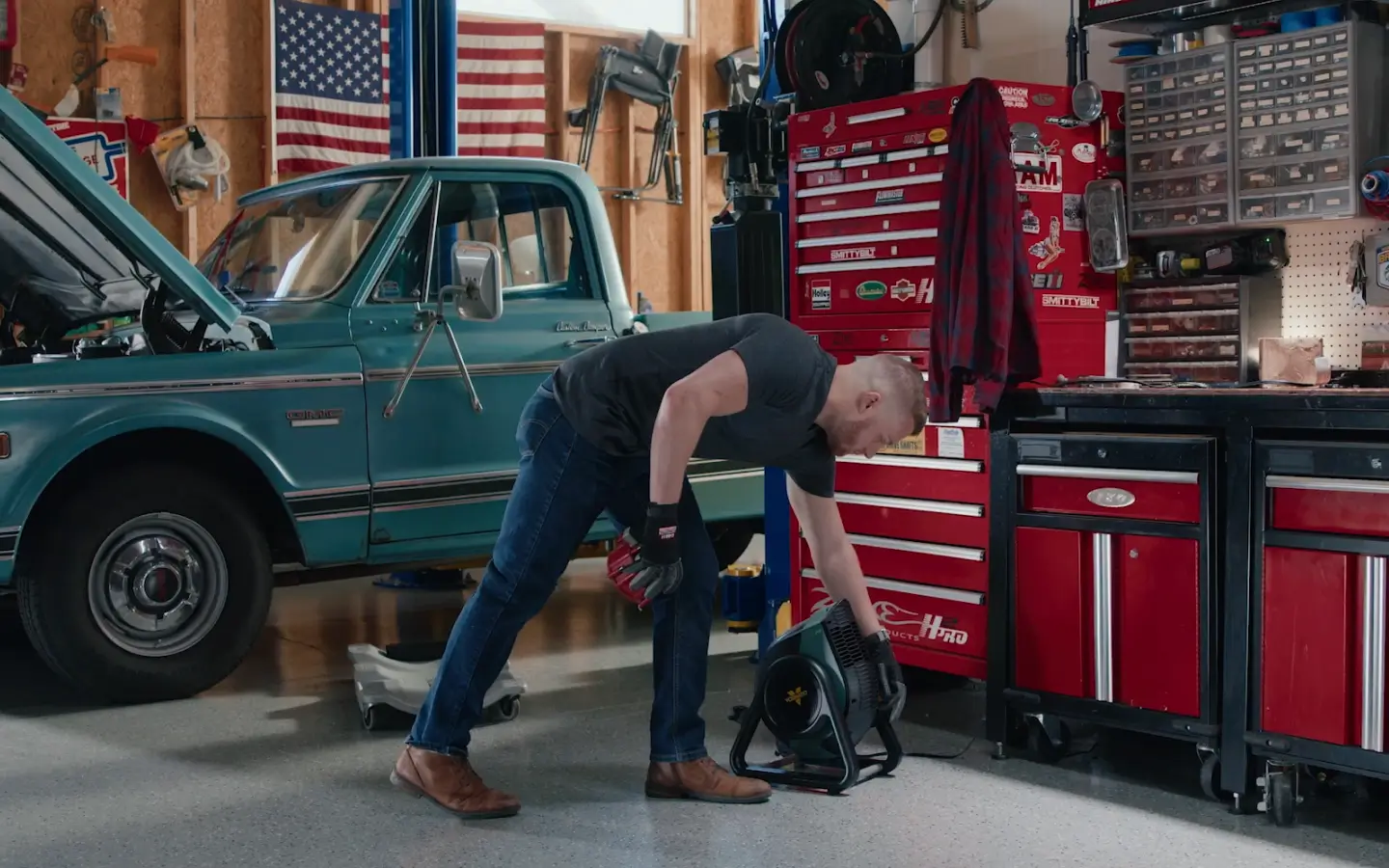 man using rtr hd in garage next to truck man using rtr hd in garage next to truck