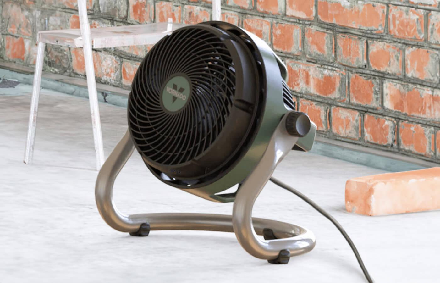 EXO61 HD Stable Steel Base EXO61 HD on a concrete floor with a brick wall.